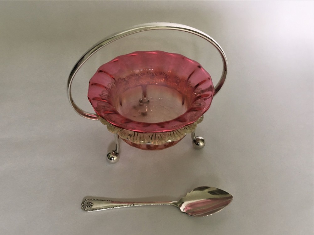A Victorian Vaseline glass and silver plated preserve dish and spoon View V