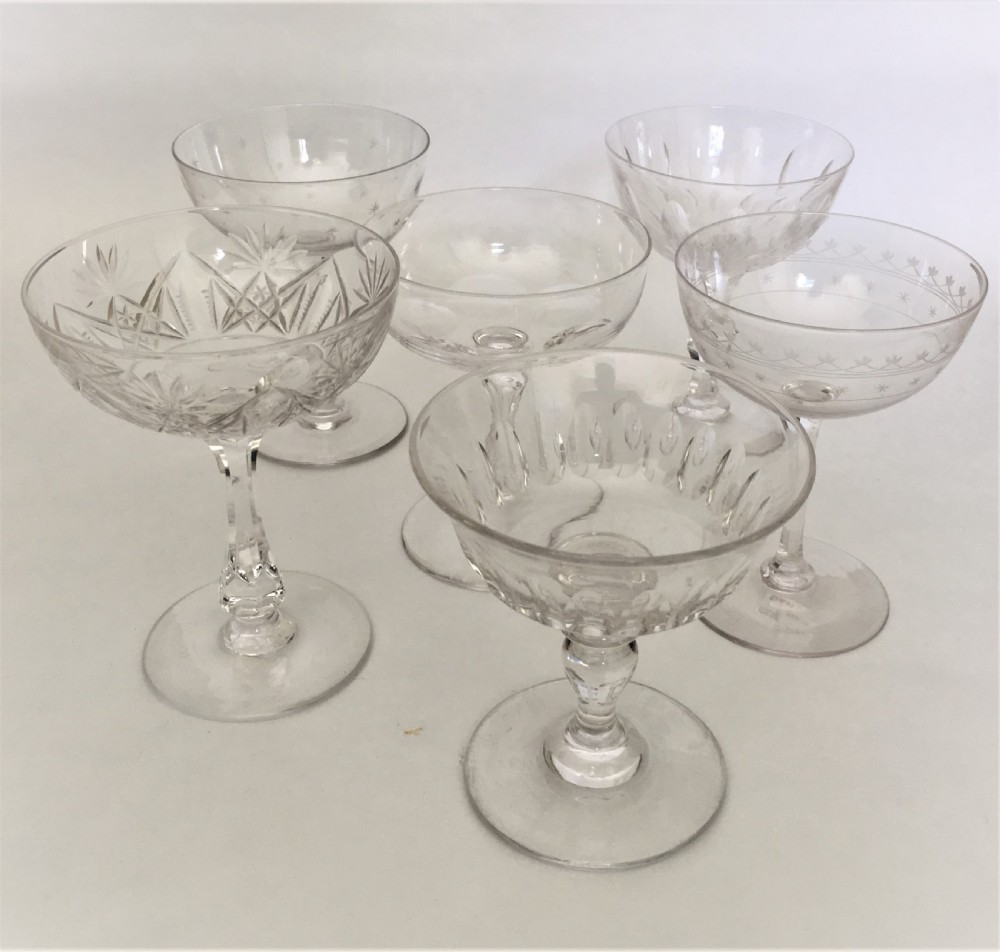 A harlequin set of 6 cut and etched champagne bowls