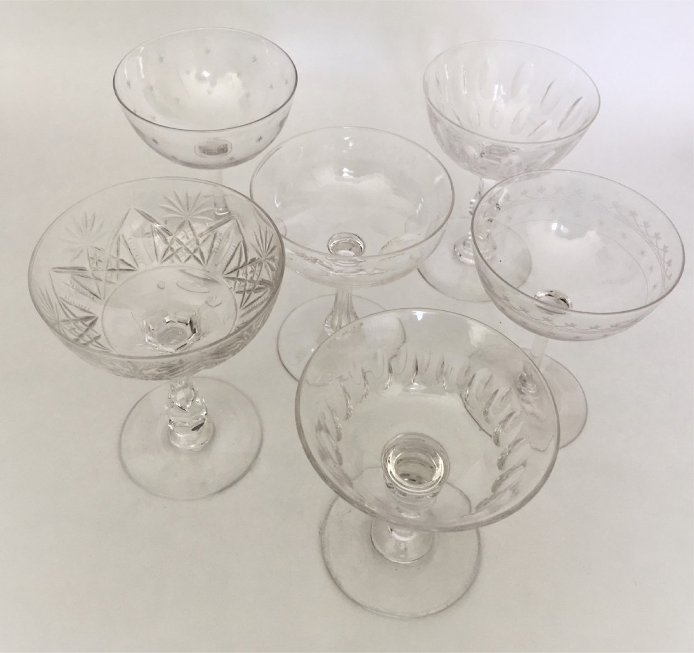 A harlequin set of 6 cut and etched champagne bowls View III