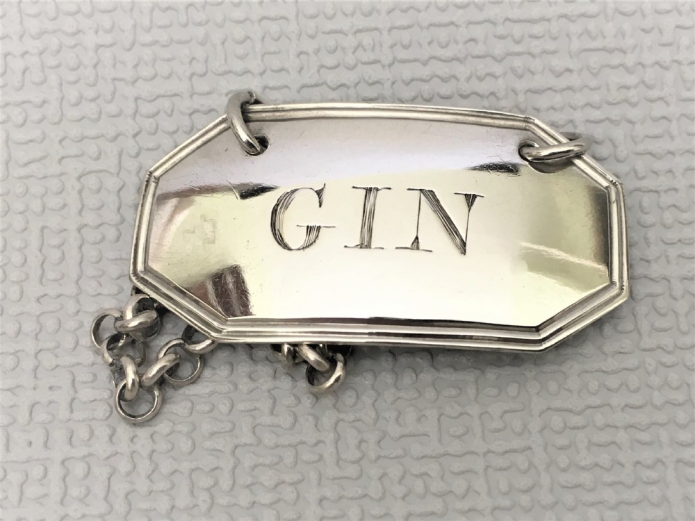 A rare Georgian silver Gin label. Female Silversmith View II