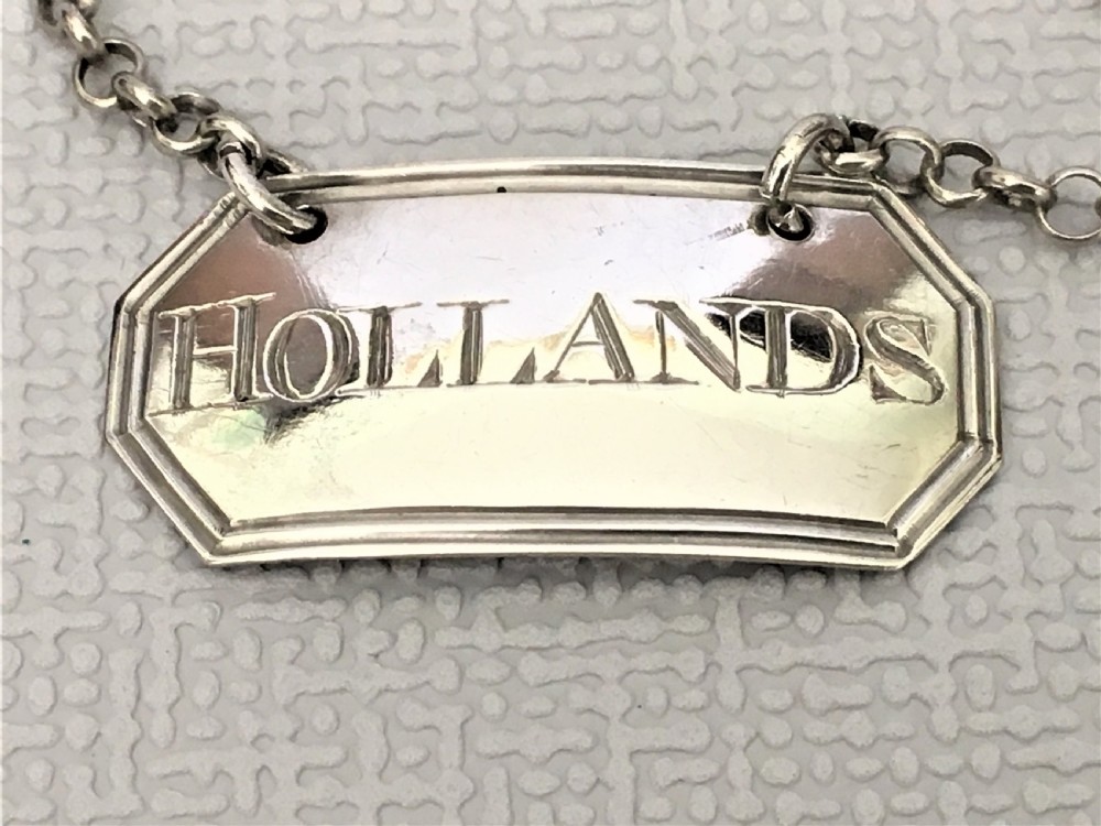 A lovely Georgian silver 'Hollands' decanter label View II