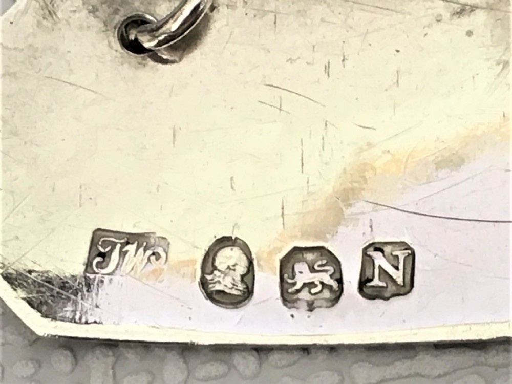 A lovely Georgian silver 'Hollands' decanter label View III