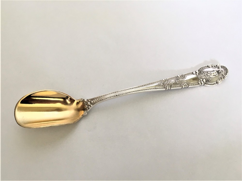 A fabulous Tiffany silver gilt stilton scoop
