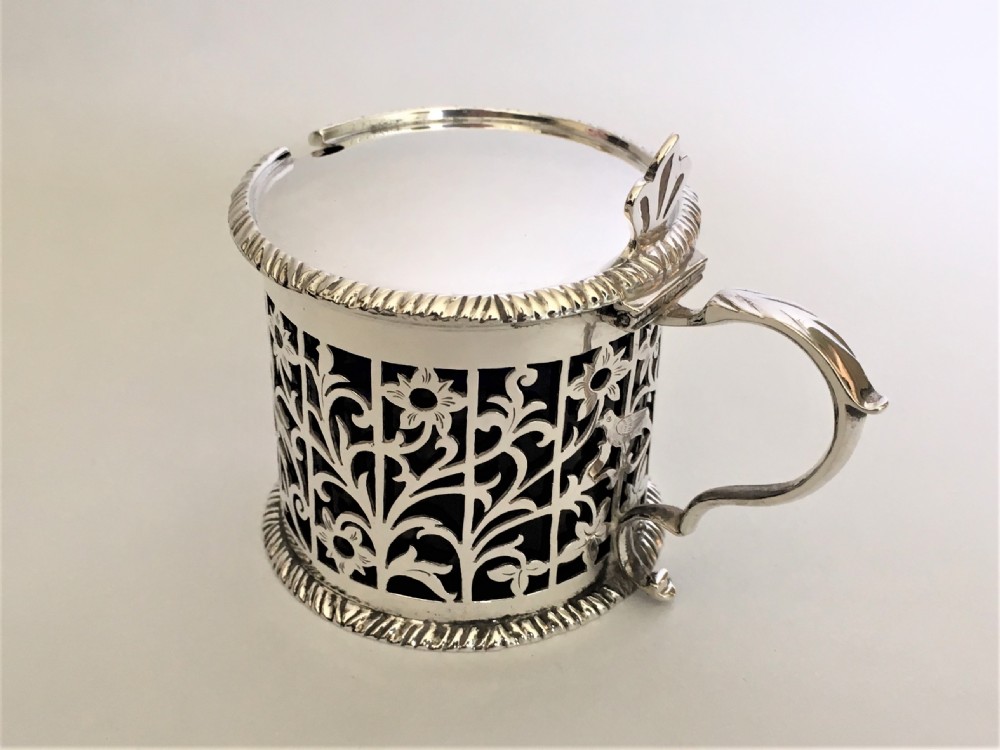 A superb pierced silver mustard pot with birds & flowers View II