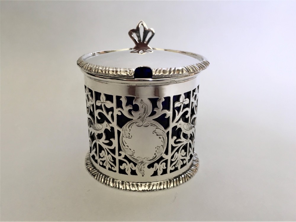 A superb pierced silver mustard pot with birds & flowers View III