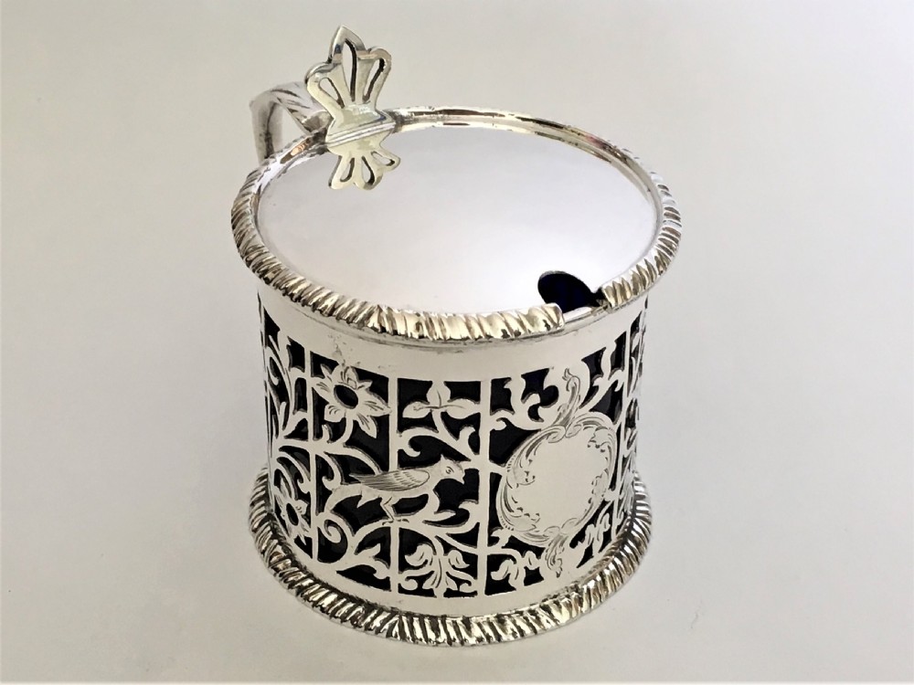 A superb pierced silver mustard pot with birds & flowers View VII
