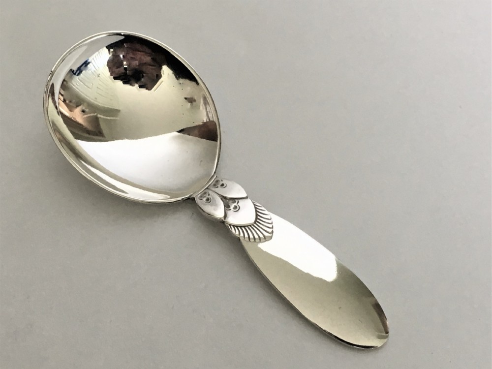 A rare Georg Jensen Cactus pattern silver caddy spoon