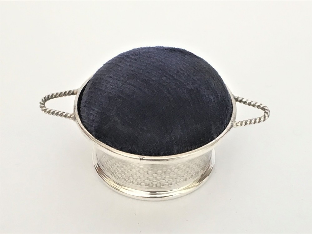 A novelty silver basket pin cushion View II