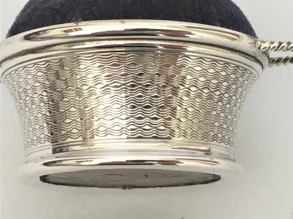 A novelty silver basket pin cushion View VII