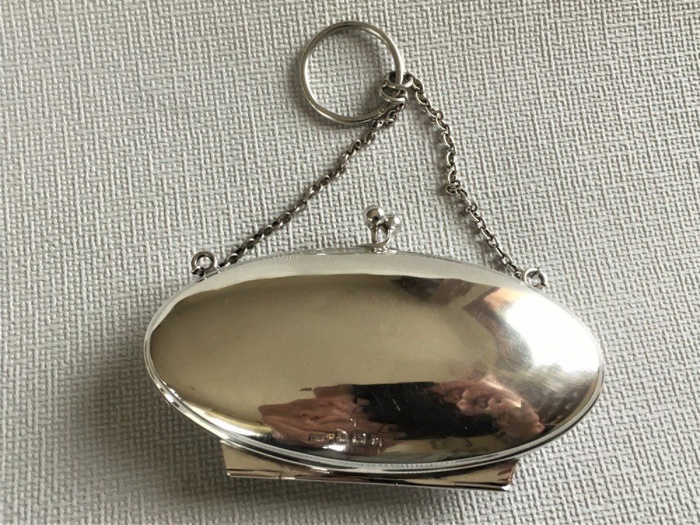 A charming silver cocktail purse