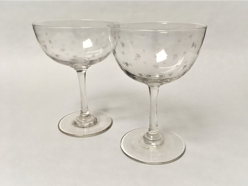 A pair of Victorian star etched champagne glasses View II