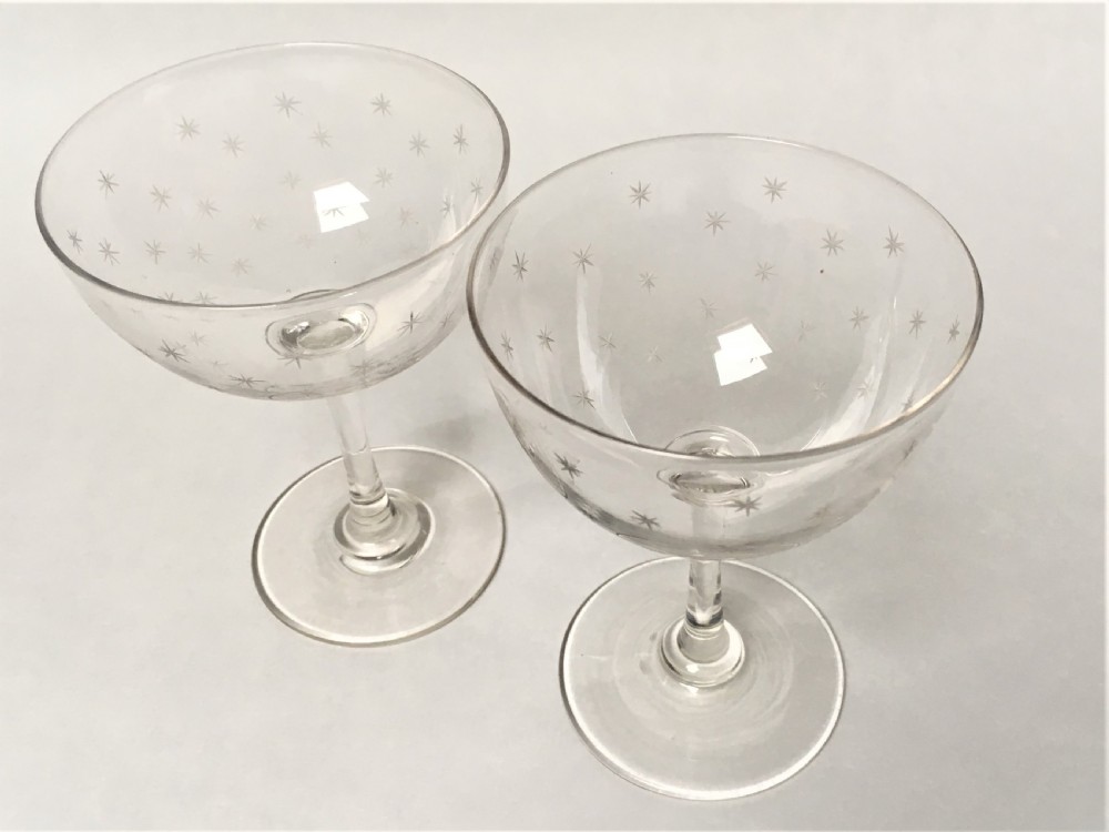 A pair of Victorian star etched champagne glasses View III