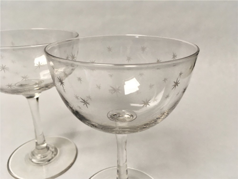 A pair of Victorian star etched champagne glasses View IV