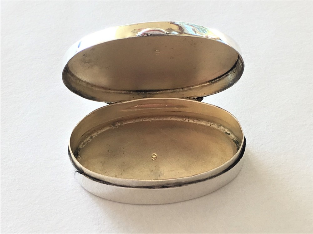 A fabulous silver & bi-coloured enamel pill box View V