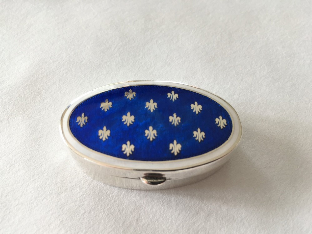 A fabulous silver & bi-coloured enamel pill box View VIII