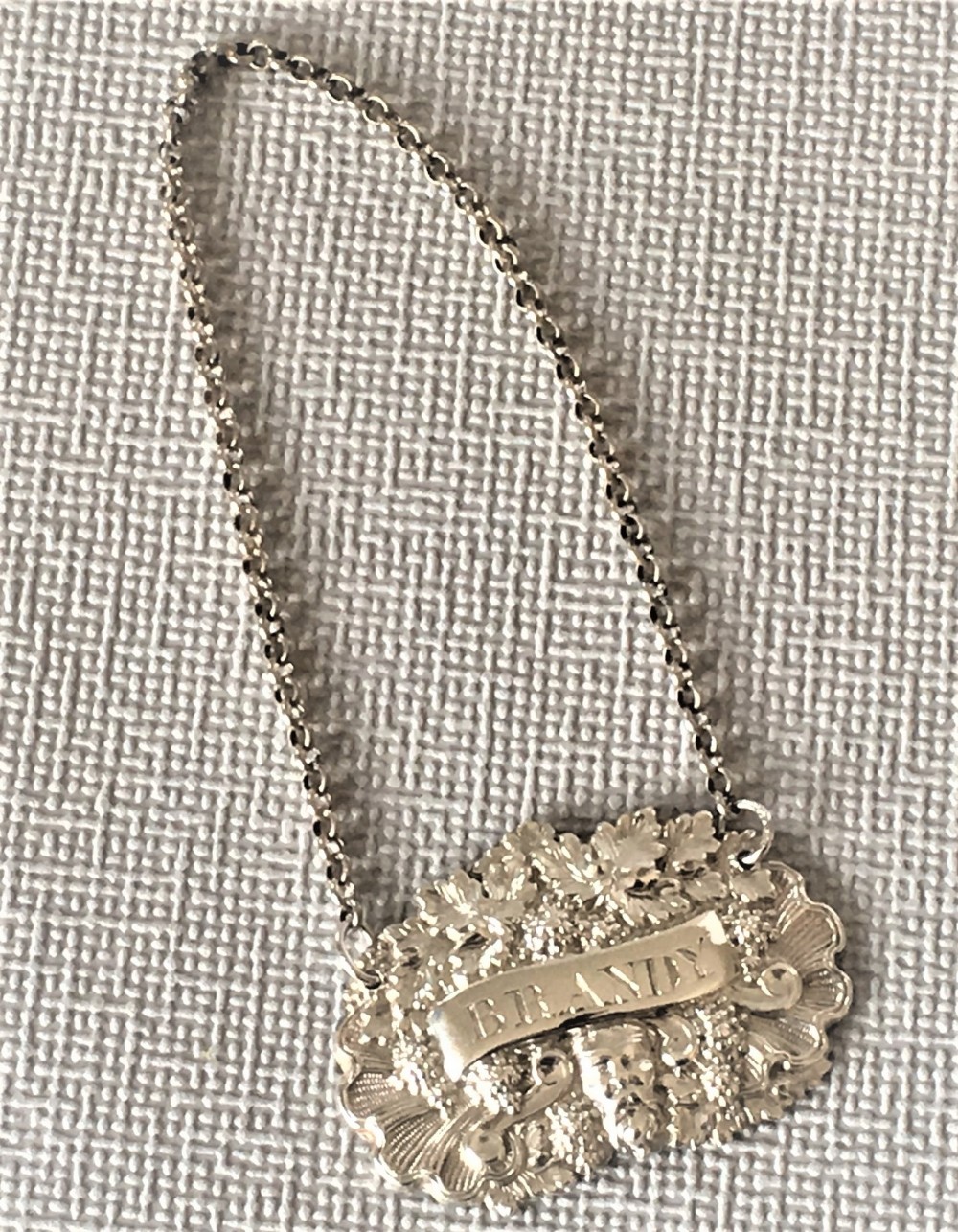A fine Georgian silver Brandy label