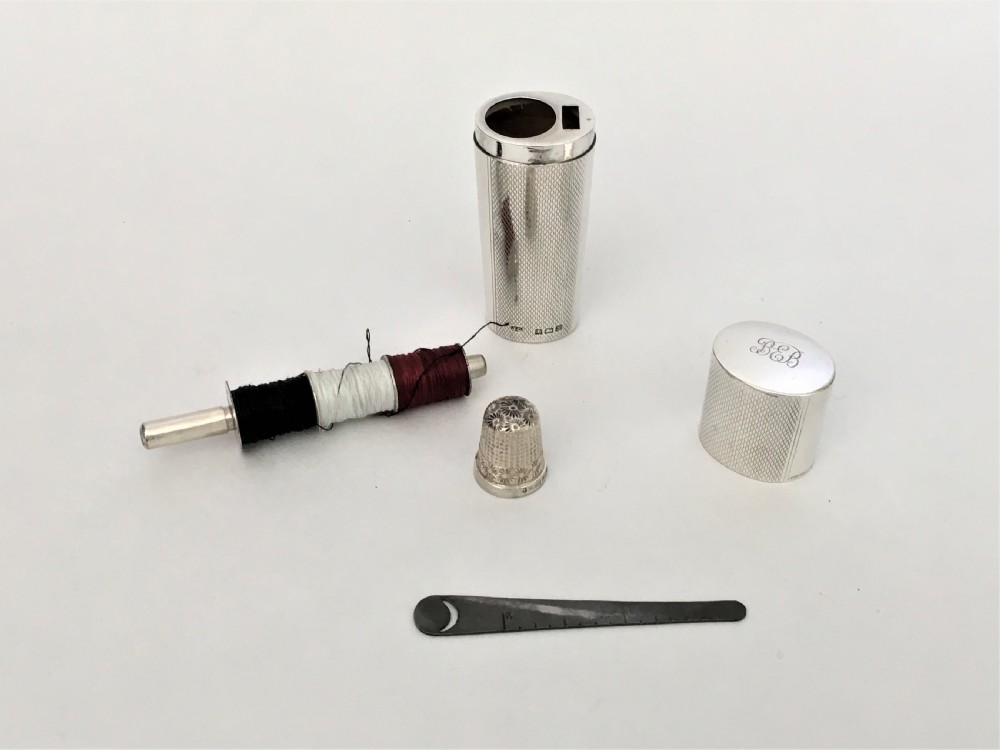 A fabulous silver cased sewing necessaire