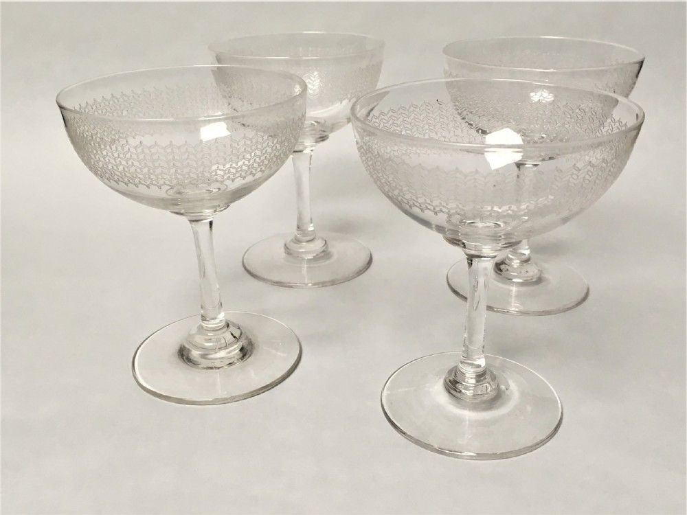 A set of 4 Victorian etched champagne bowls