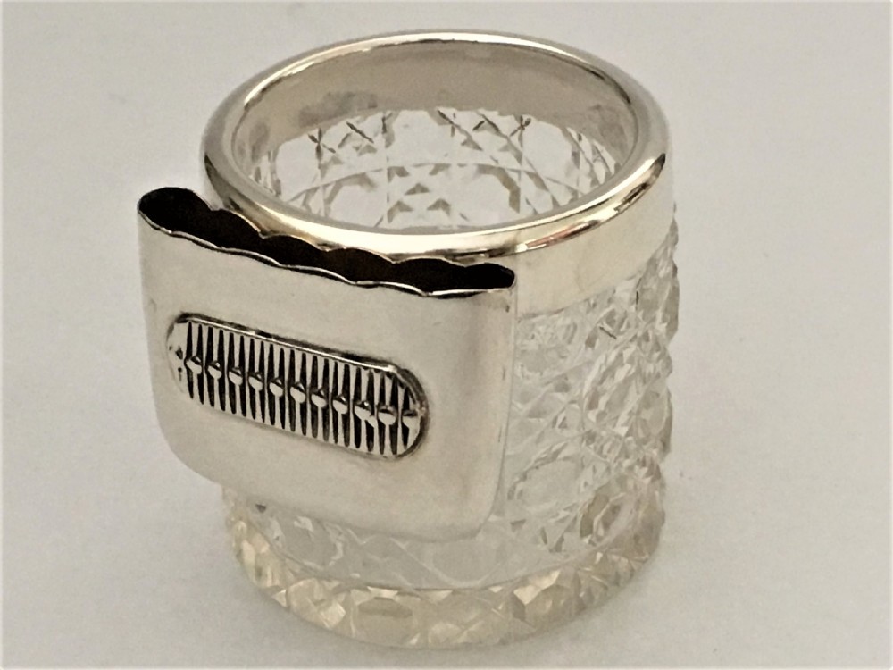 An unusual silver vesta/match striker pot View V