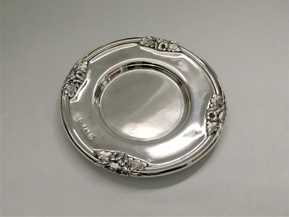 A magnificent William IV silver wine bottle/decanter coaster View III