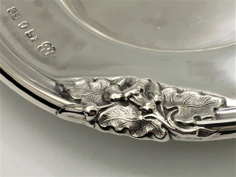 A magnificent William IV silver wine bottle/decanter coaster View IV