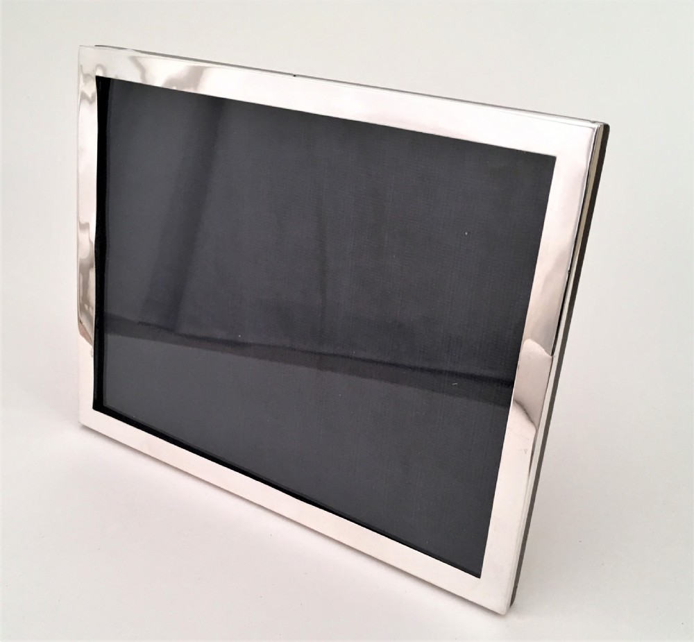 A handsome silver landscape/portrait photo frame