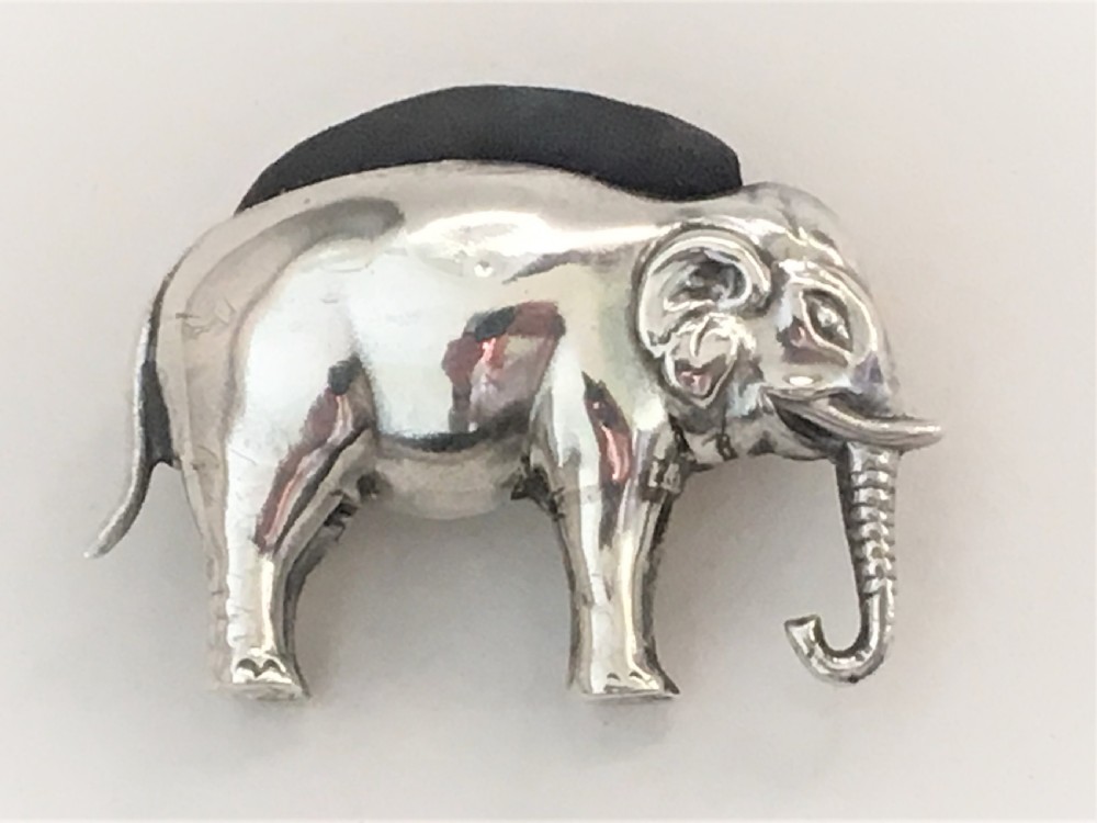 A rare Edwardian silver elephant pin cushion