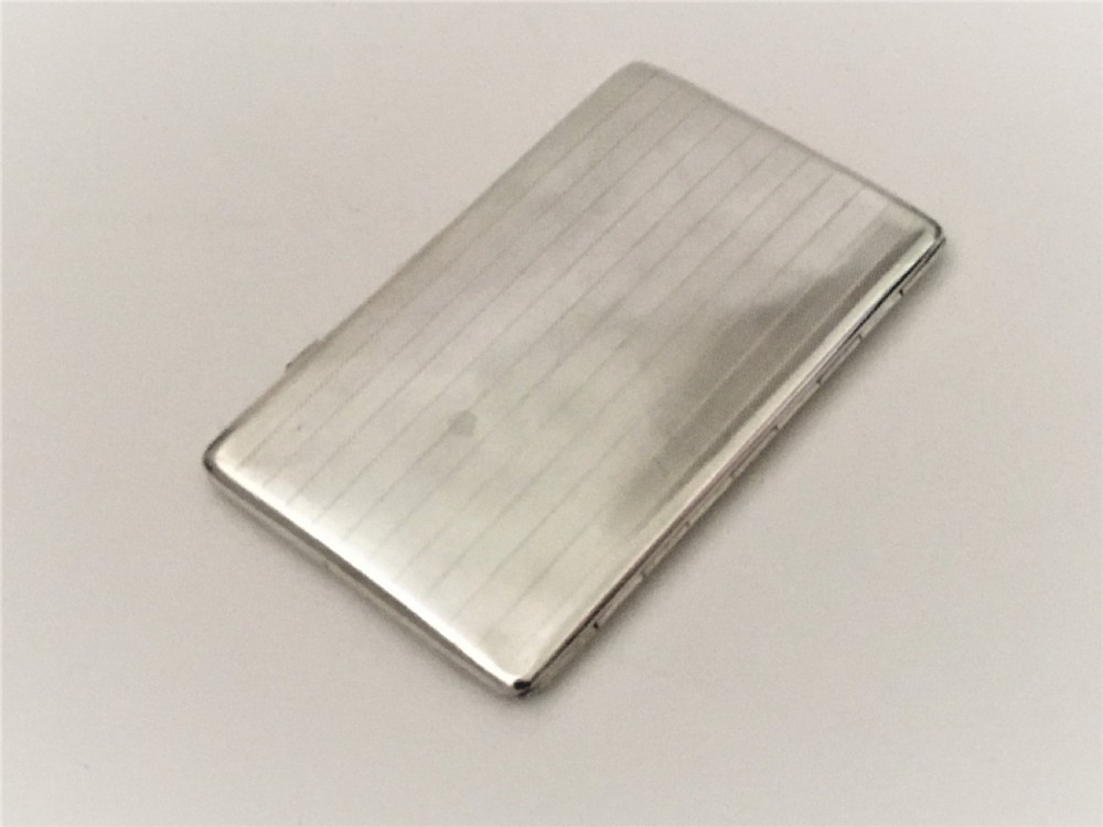 A handsome Art Deco silver card/cigarette case