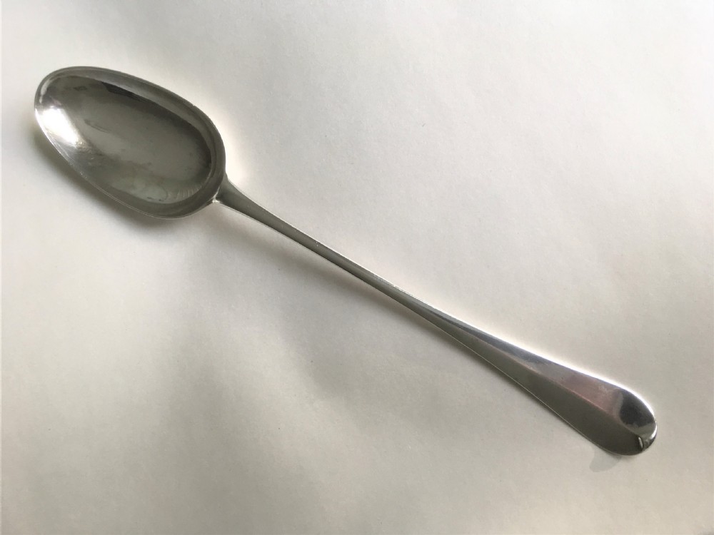 A magnificent early 18th Century hash spoon