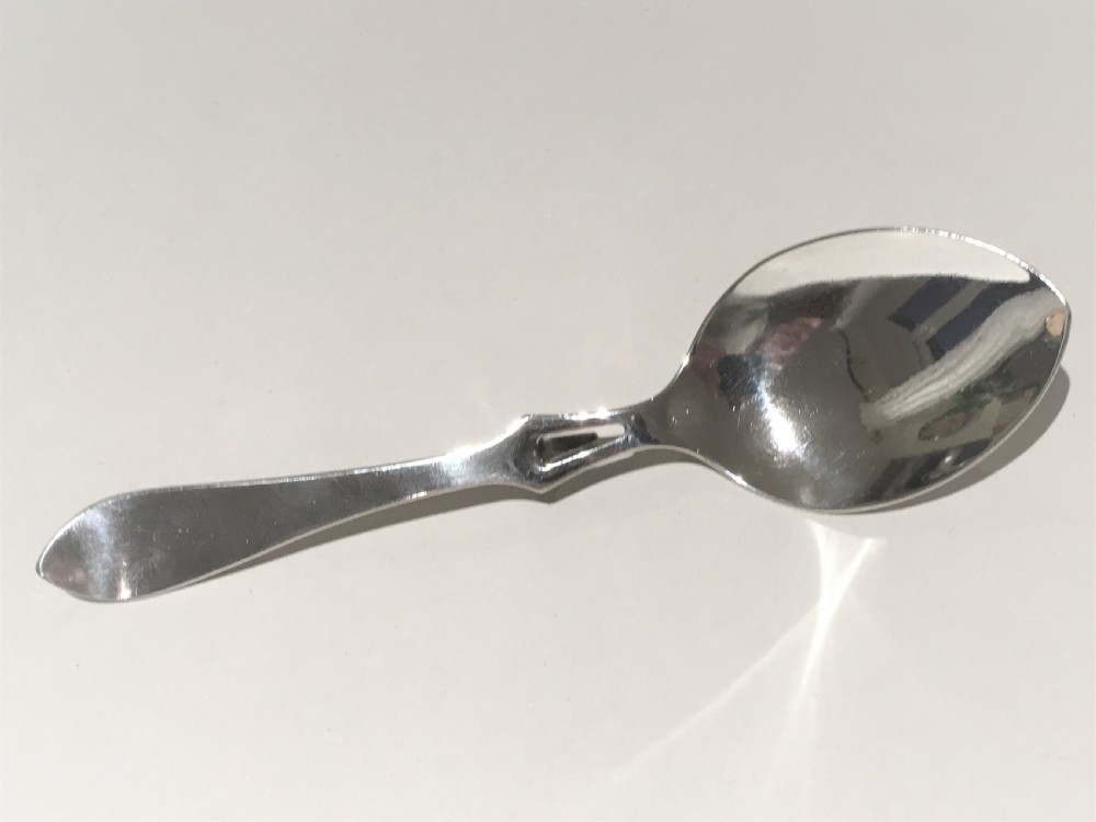 A desirable George V silver honey spoon