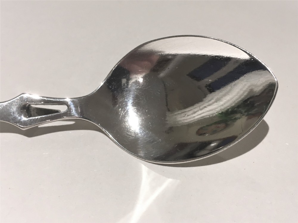A desirable George V silver honey spoon View II
