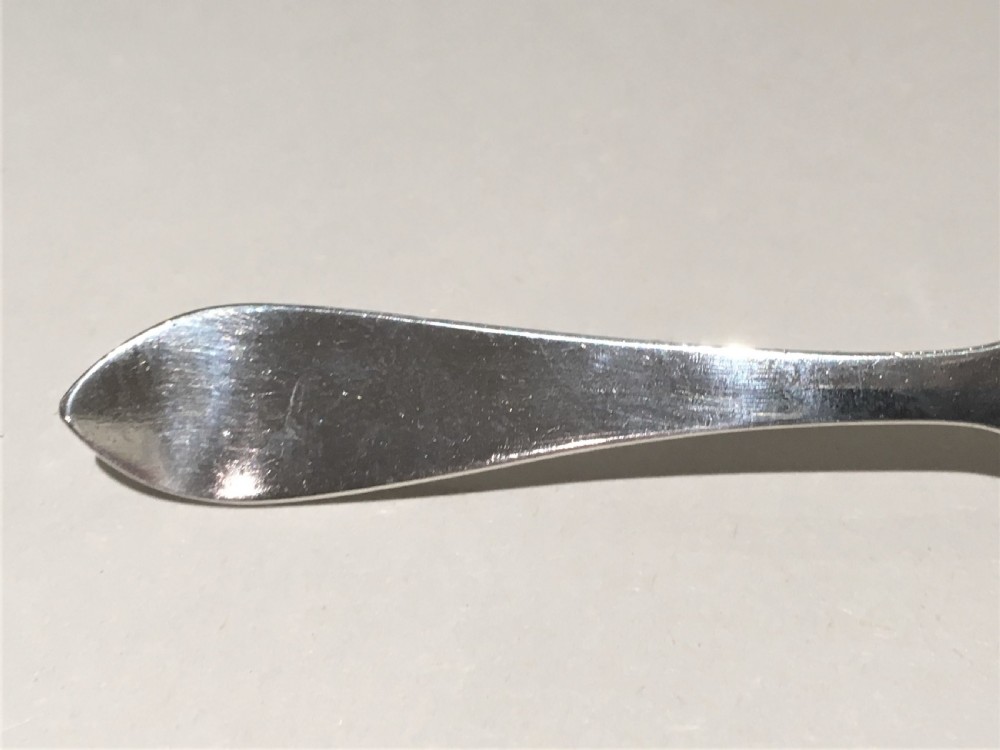 A desirable George V silver honey spoon View III