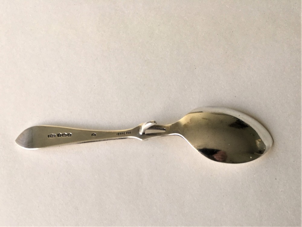 A desirable George V silver honey spoon View VII