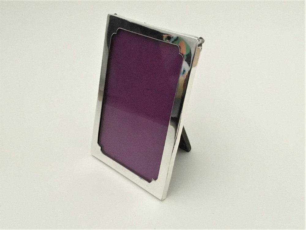A charming small silver photo frame