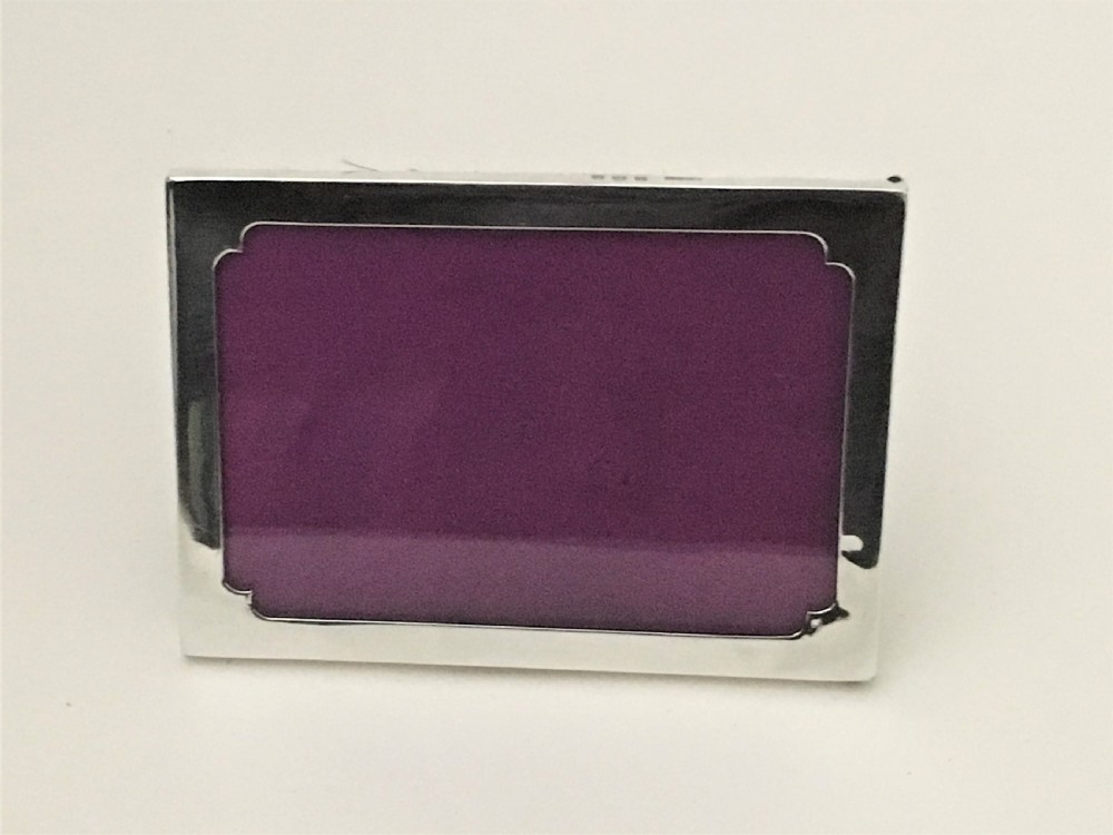 A charming small silver photo frame View IV