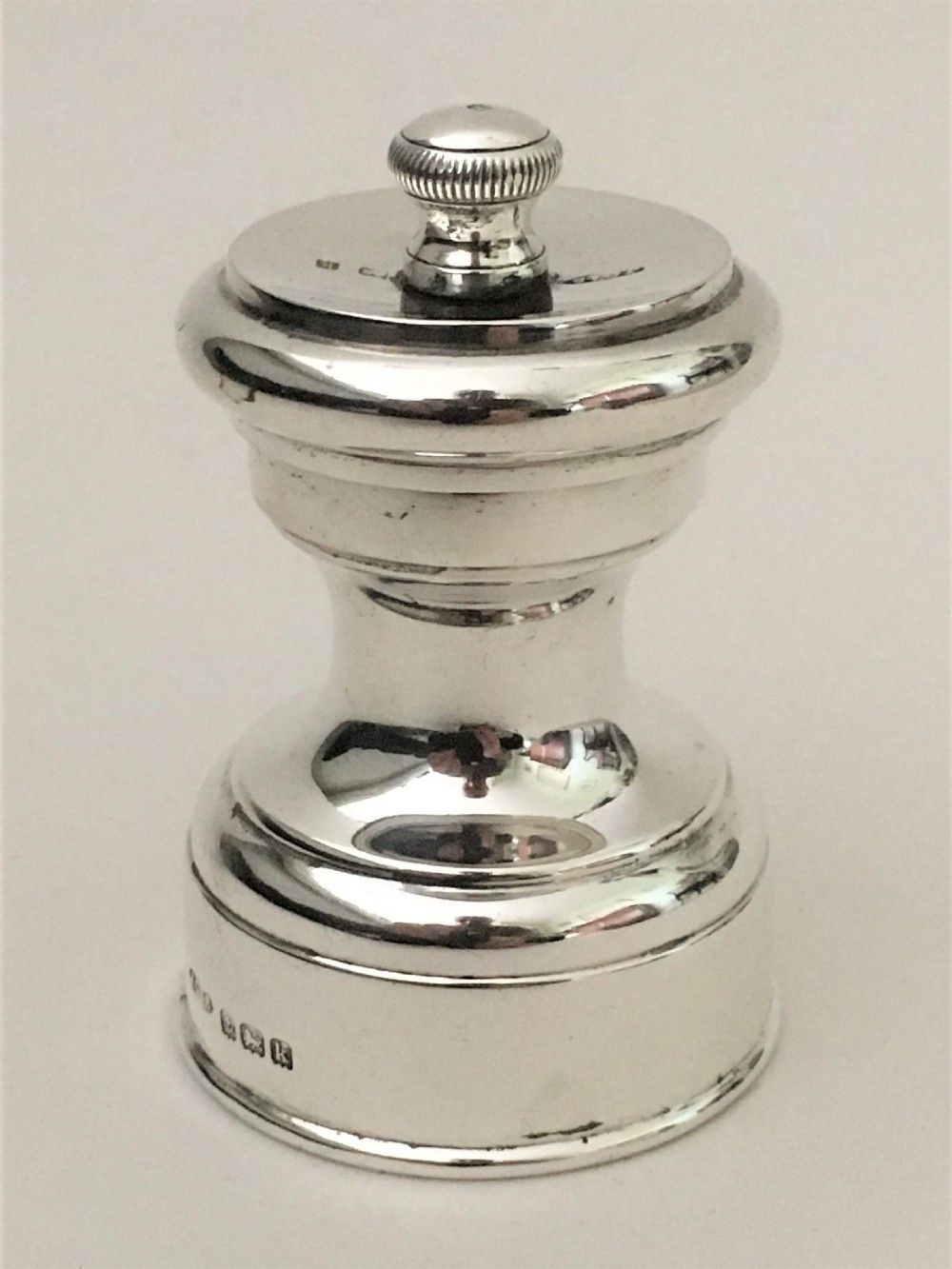 A gorgeous all silver Edwardian pepper grinder View V