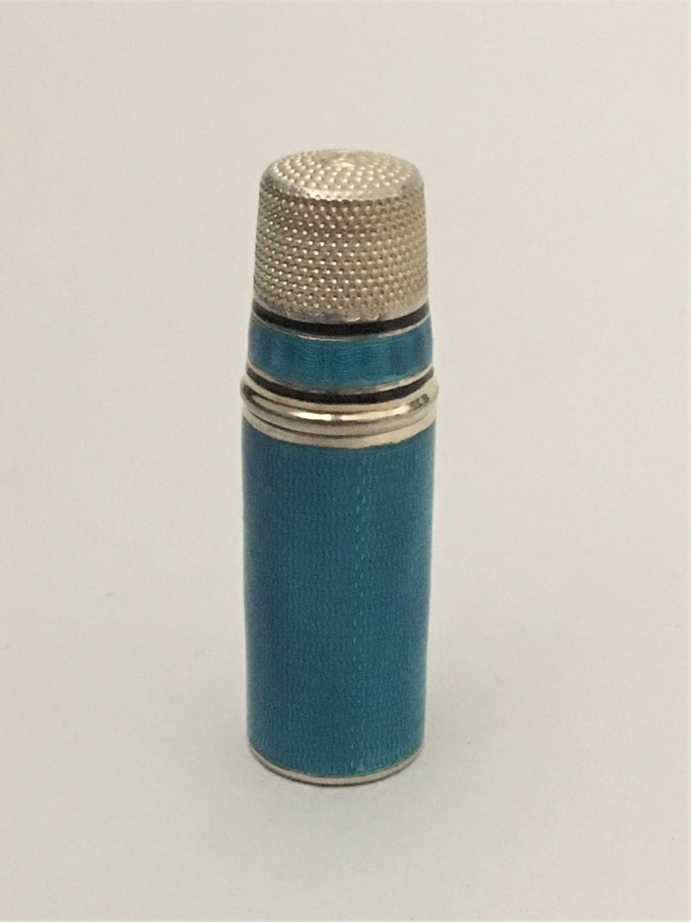 A superb silver gilt and enamel sewing necessaire