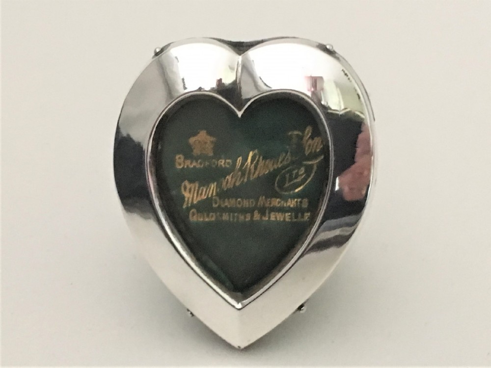 A Victorian William Comyns miniature silver heart frame