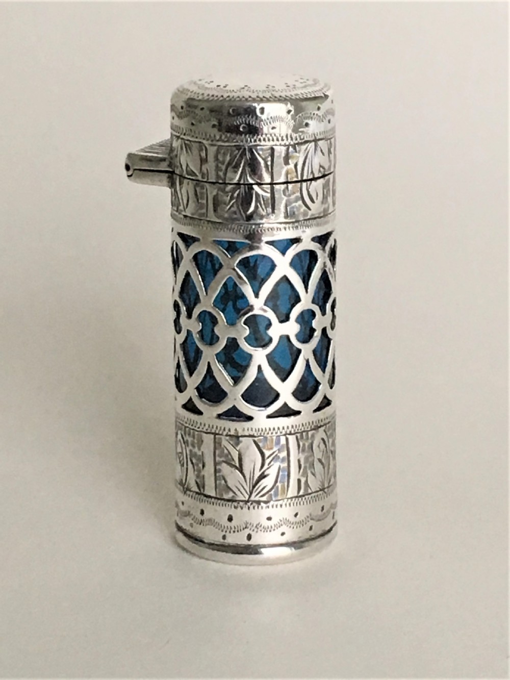 A gorgeous Edwardian pierced silver scent bottle