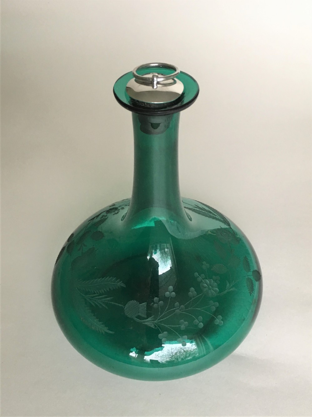 A Georgian Bristol Green decanter with silver stopper View II