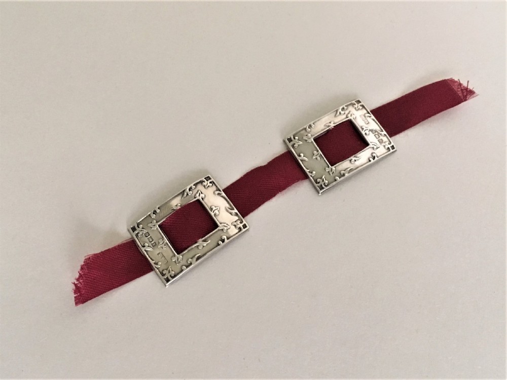 A delightful pair of Edwardian silver shoe buckles