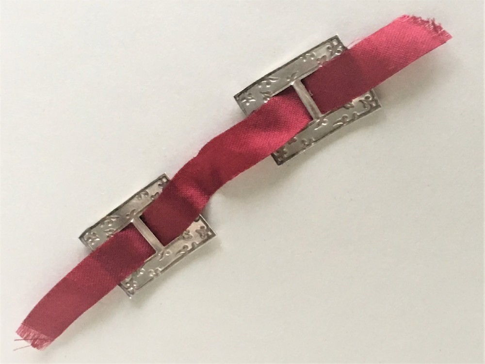 A delightful pair of Edwardian silver shoe buckles View III