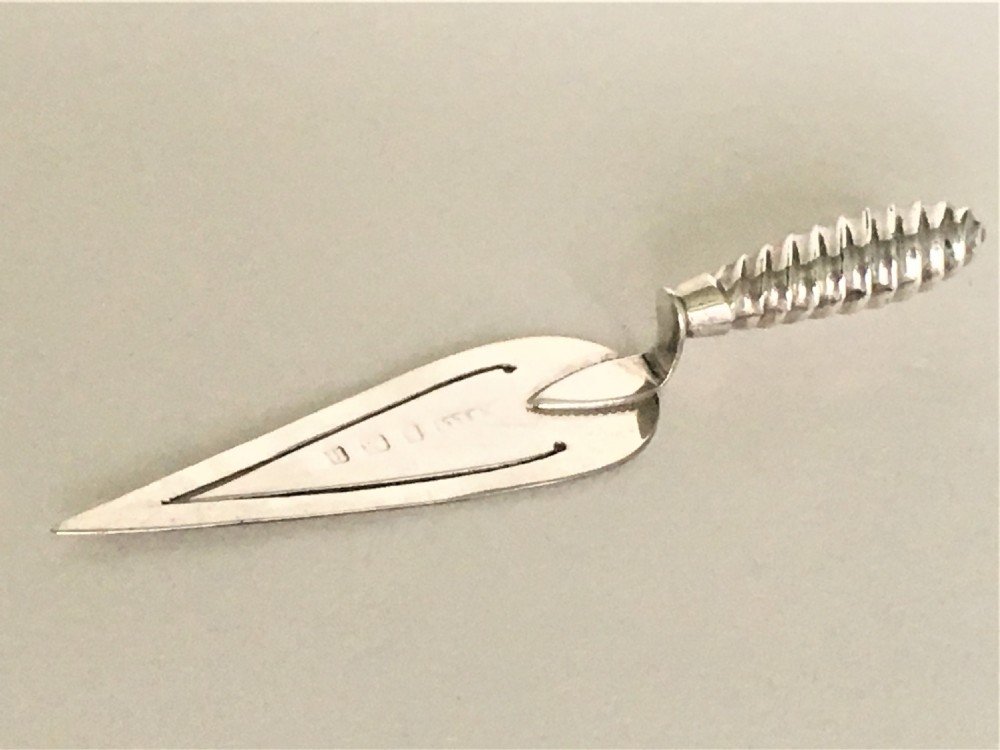 A novelty all silver trowel bookmark