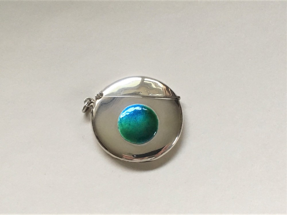 A superb silver & enamel round vesta