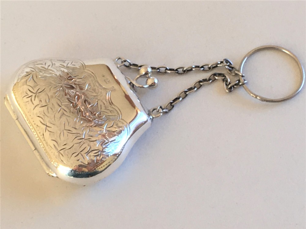 A diminutive Edwardian silver cocktail purse
