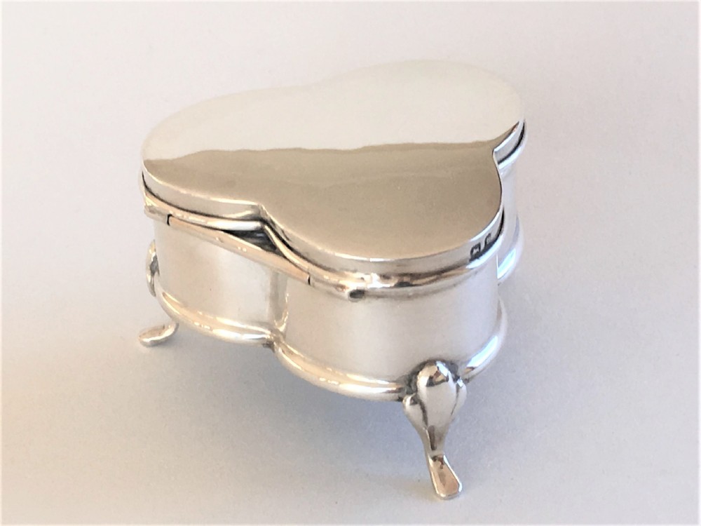 A delightful trefoil silver trinket box