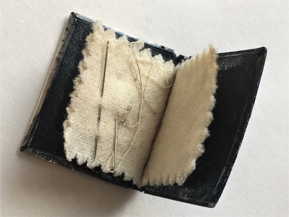 A charming Edwardian silver needle book View III