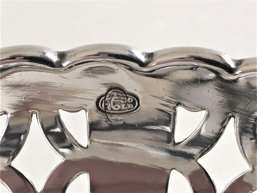 A lovely silver & cranberry dish View VI
