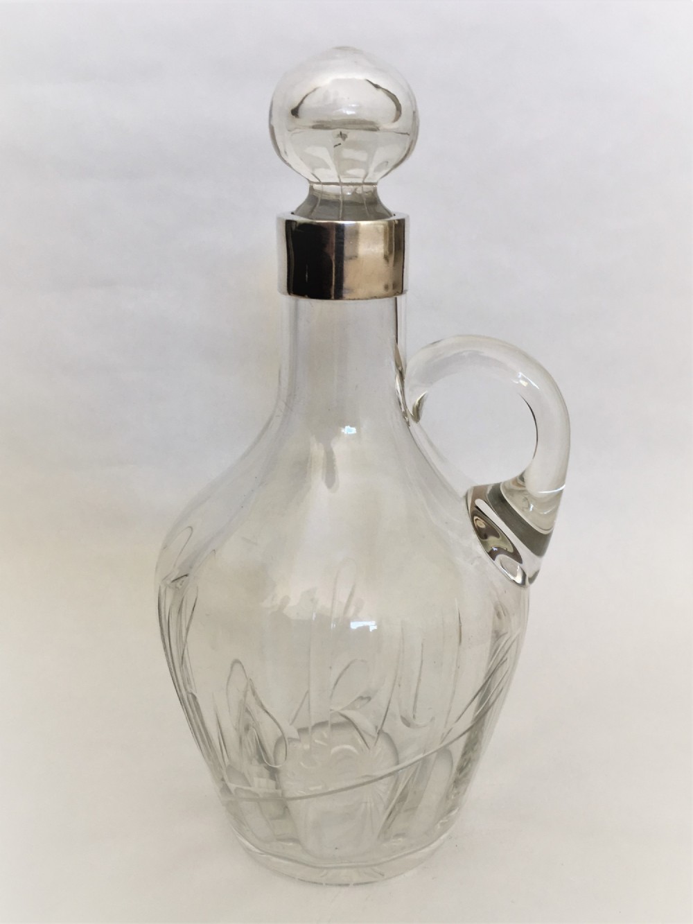 An Edwardian silver mounted Whisky decanter