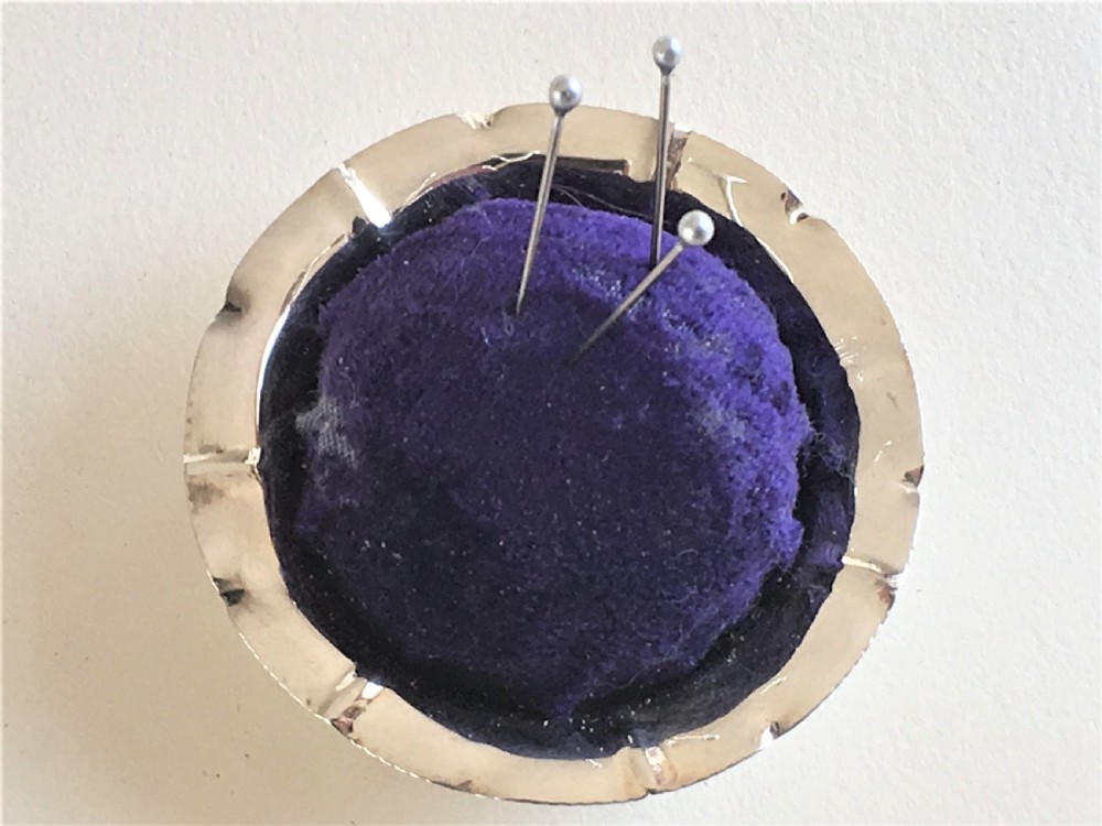 An unusual novelty Chester silver 'pie' pin cushion View III
